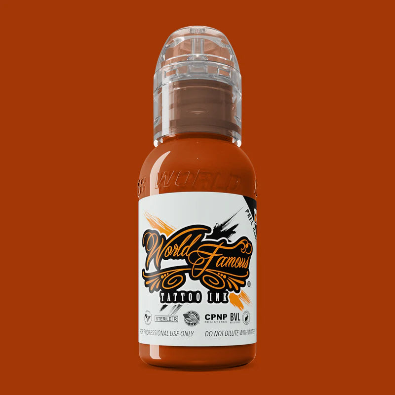 burnt orange tattoo ink, warm orange ink, shading tattoo color, realistic tattoo pigments, long-lasting tattoo ink, autumn orange tattoo, World Famous Ink.