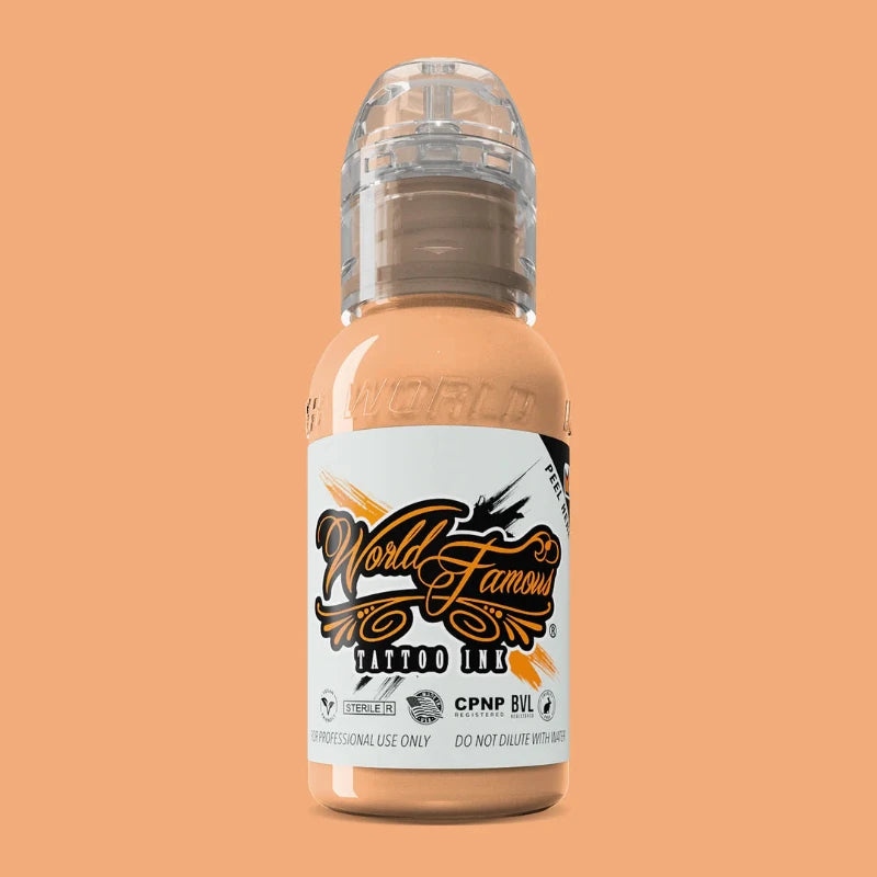 World Famous Aesir Flesh #1 is a soft, creamy peach with warm golden undertones, capturing a delicate and radiant skin tone. This versatile shade is ideal for achieving subtle highlights, blending effects, or adding realistic details to your tattoo designs.